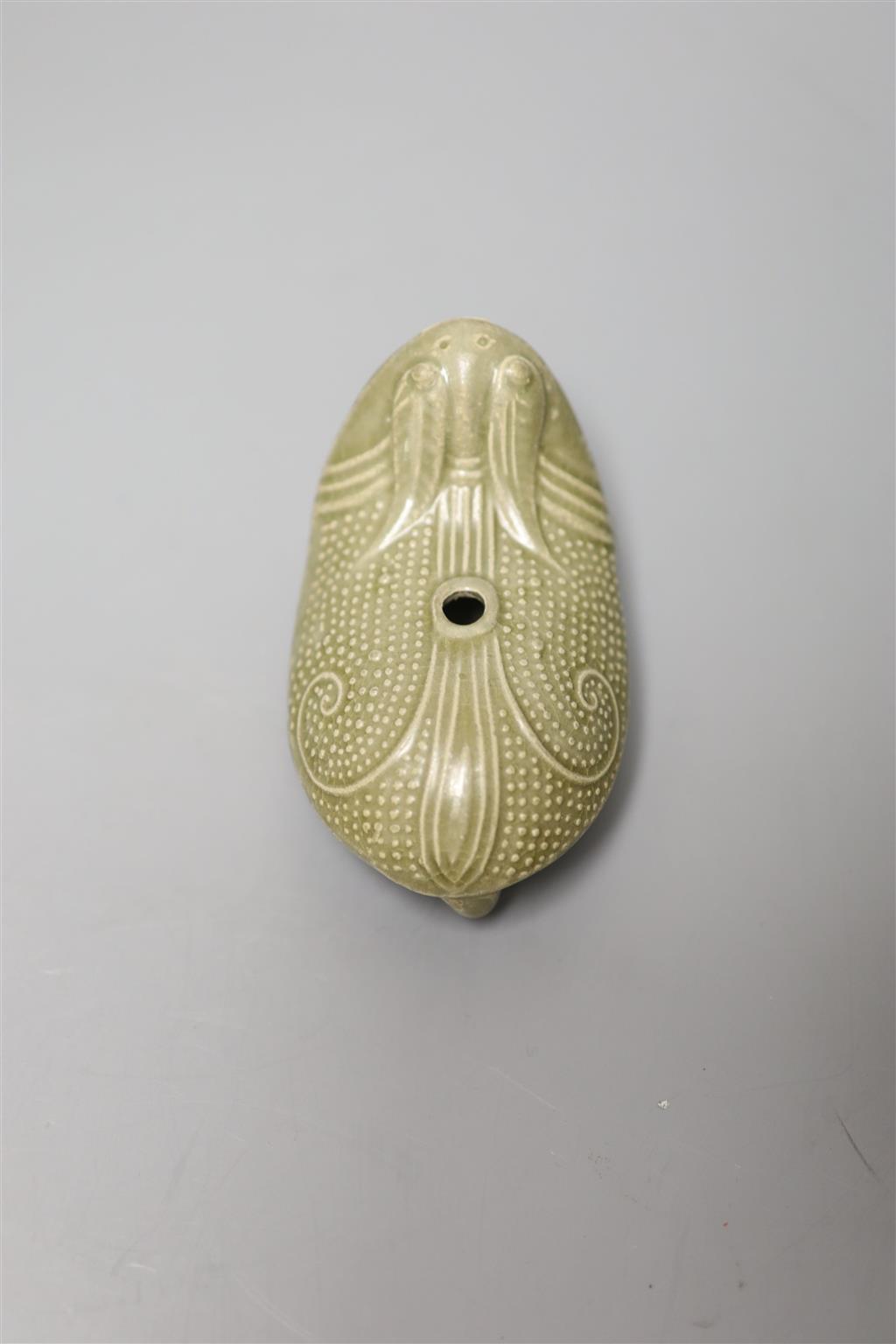 A Chinese Longquan celadon three legged toad water dropper, length 11cm